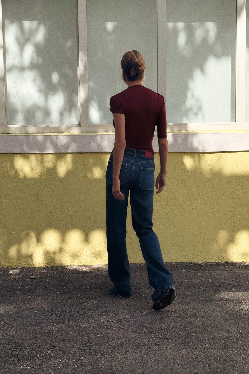 Disha Patani Luxe Asymmetric Buckle Bliss Top