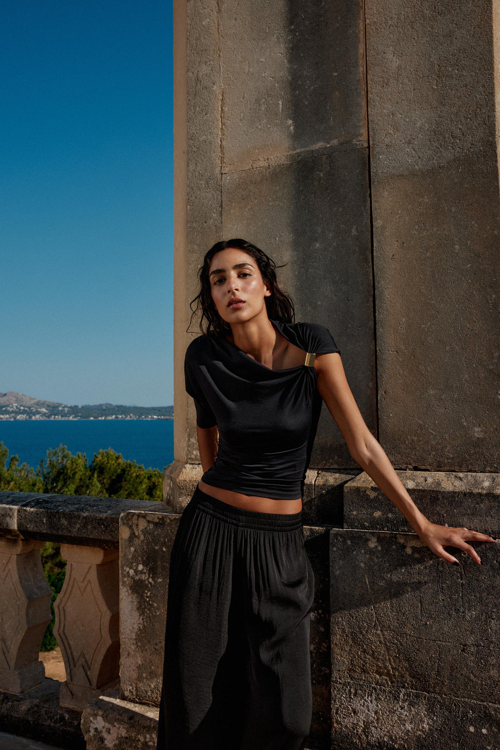 Disha Patani Luxe Asymmetric Buckle Bliss Top