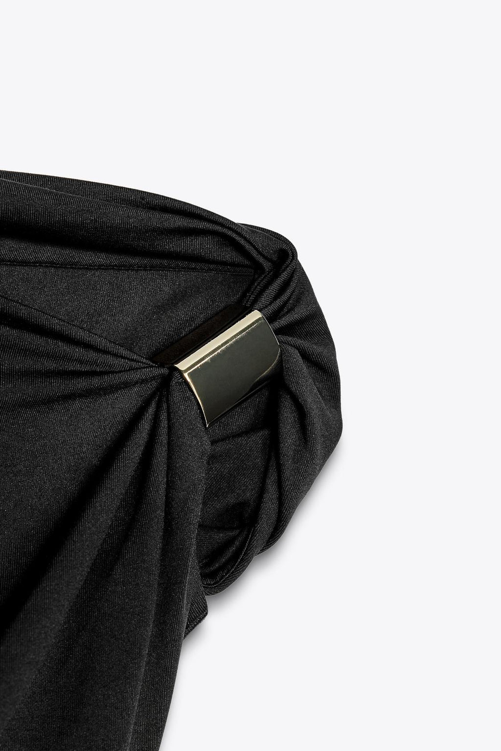 Disha Patani Luxe Asymmetric Buckle Bliss Top