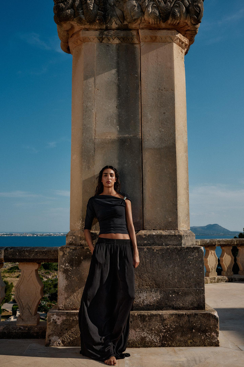 Disha Patani Luxe Asymmetric Buckle Bliss Top