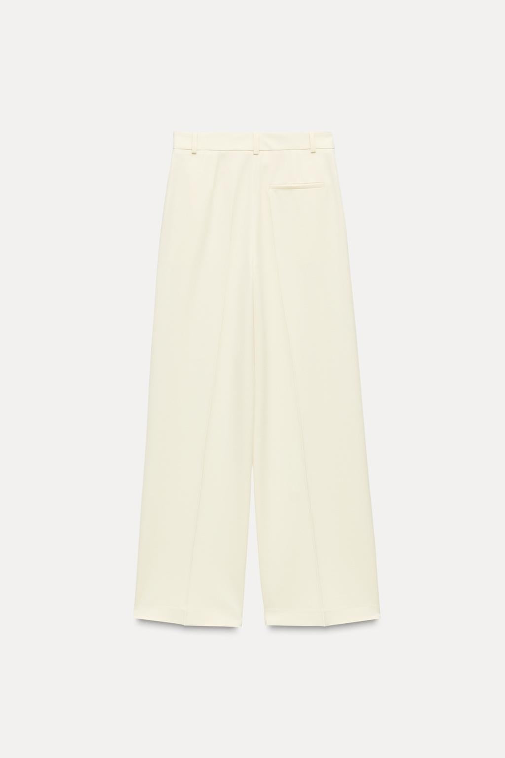 OFF-WHITE PLEATED TROUSERS