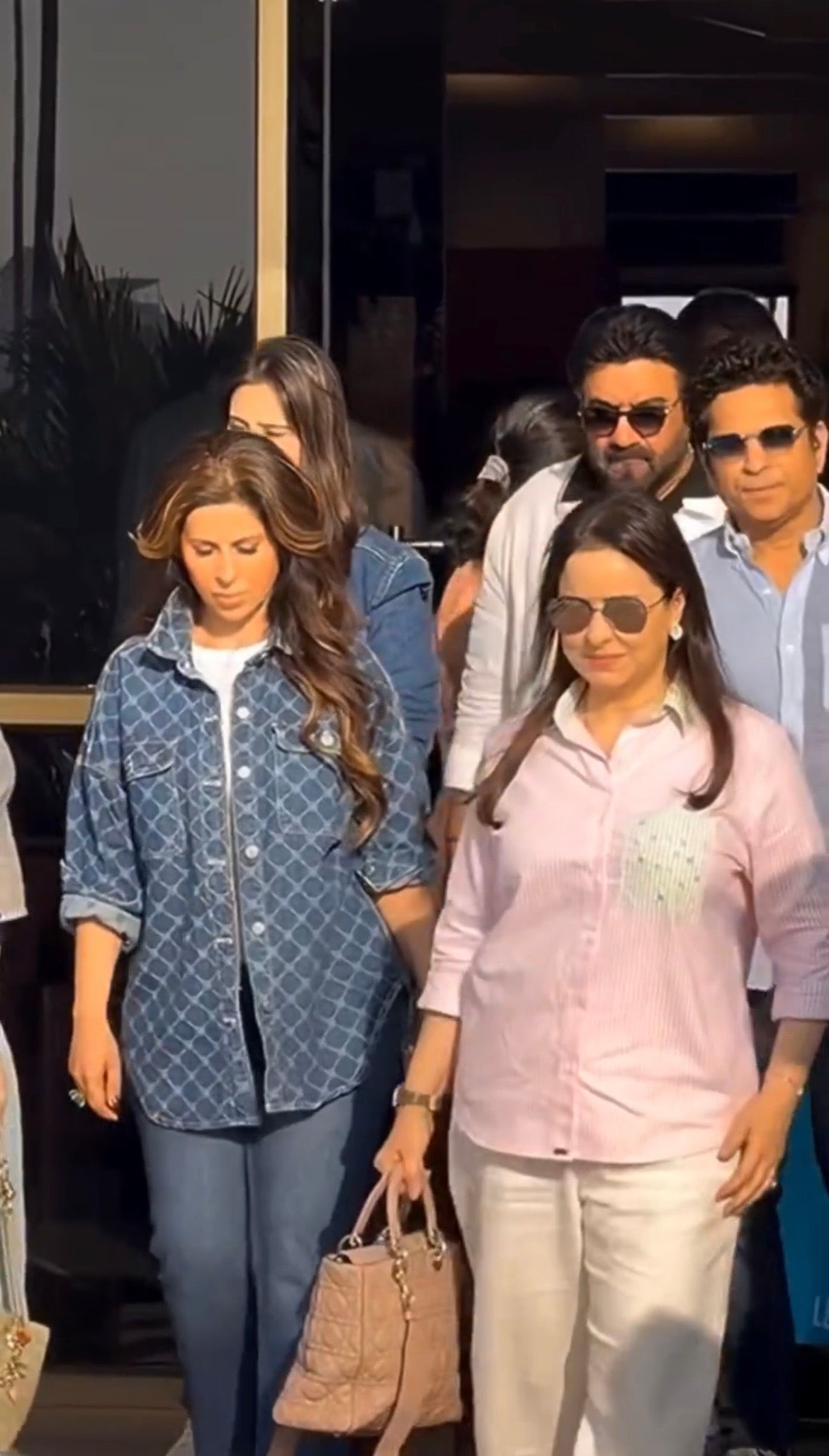 anjali tendulkar pink stripped shirt with beads