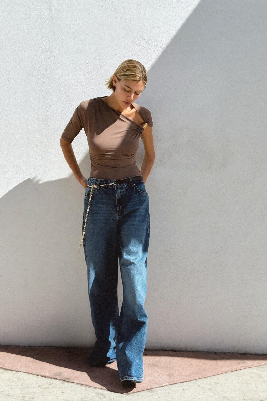 Disha Patani Luxe Asymmetric Buckle Bliss Top