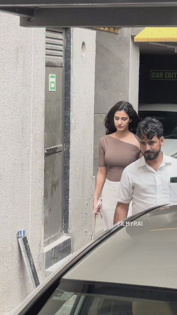 Disha Patani Luxe Asymmetric Buckle Bliss Top